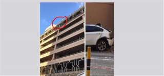 سقوط امرأة بسيارتها من الطابق...