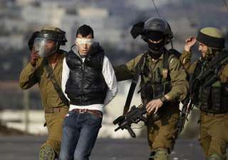 اعتقال 14 فلسطينيا في الضفة...