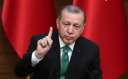 أردوغان: تركيا سترد على أية...