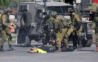 استشهاد شاب فلسطينى وإصابة 21...