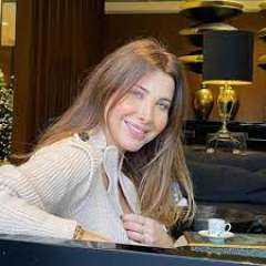 نانسى عجرم تقرر وقف الغناء...