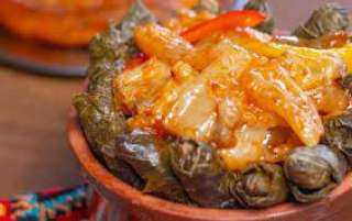 طبخ طاجن ورق عنب بالكوارع