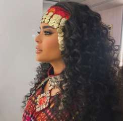أسماء جلال تروج لأحدث أفلامها...