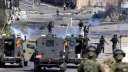 إصابة 11 فلسطينيا خلال اقتحام...