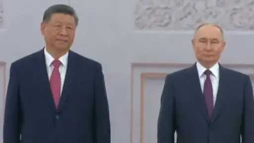 بوتين يستقبل شي جين بينج...