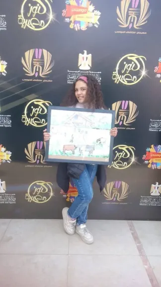 الطالبة أسماء إبراهيم شلبي، حاصلة على المركز الأول في كفر الشيخ