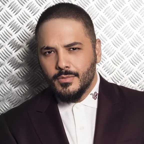 من لقاء عفوي إلى ترند.. تفاصيل مفاجأة الفنان اللبناني رامي عياش على الهواء