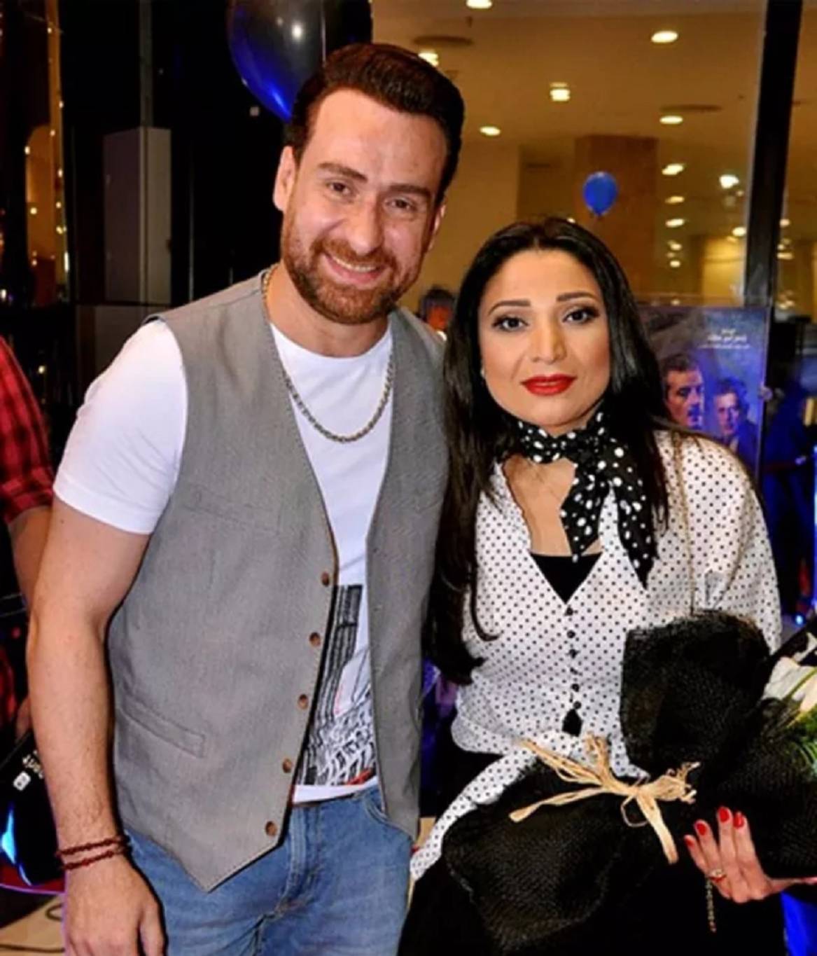 نضال الشافعي وزوجته 
